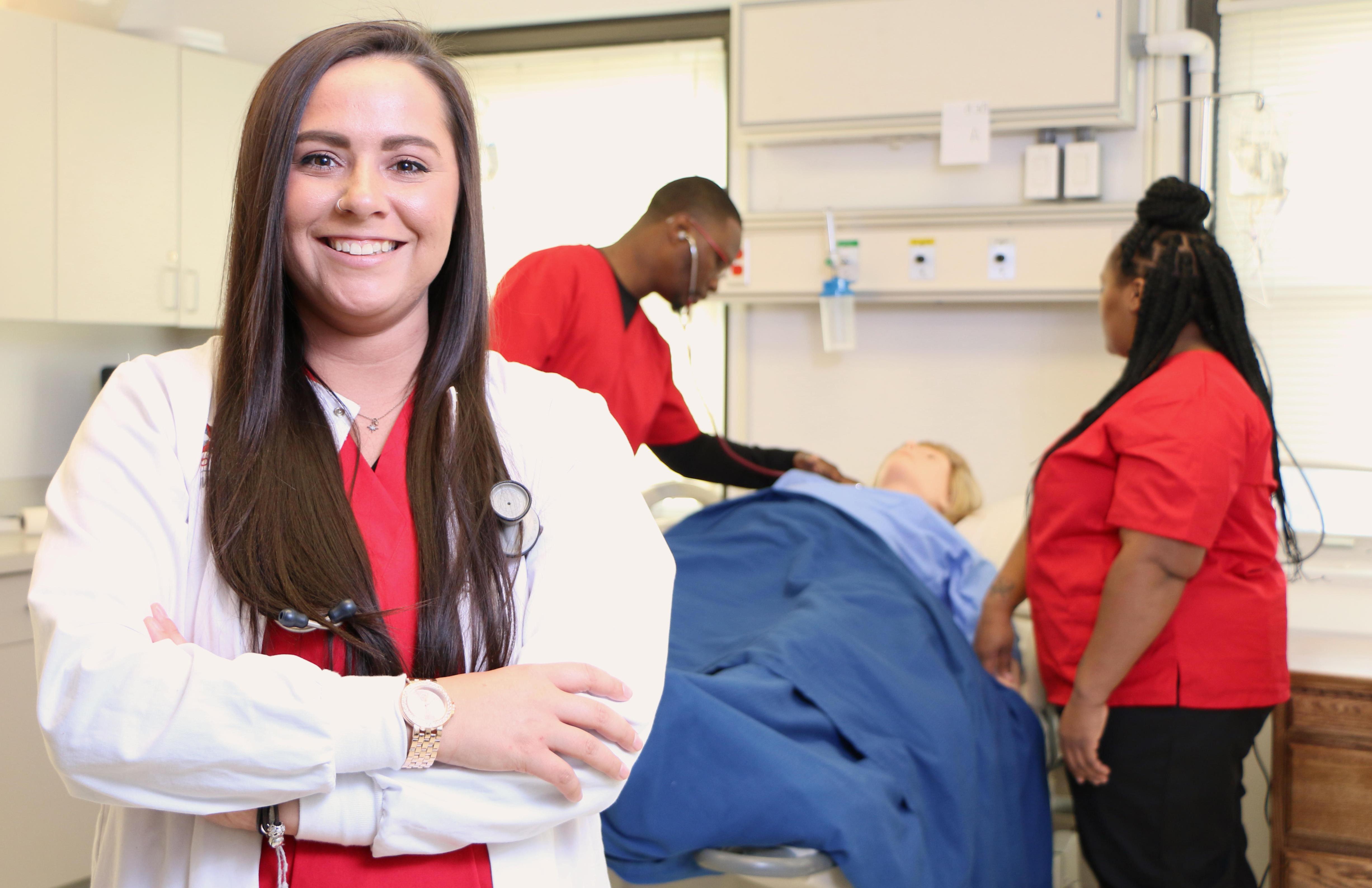 Nursing Program. Students in nursing program. Diverse, affordable. CNA. PN. RN. Registered Nurse, Practical Nurse, Certified Nurse Aide. Pass rate. Donnelly College in Kansas City, Kansas. Certificate and Degree. Associate degree and Bachelor's degrees pathways. 